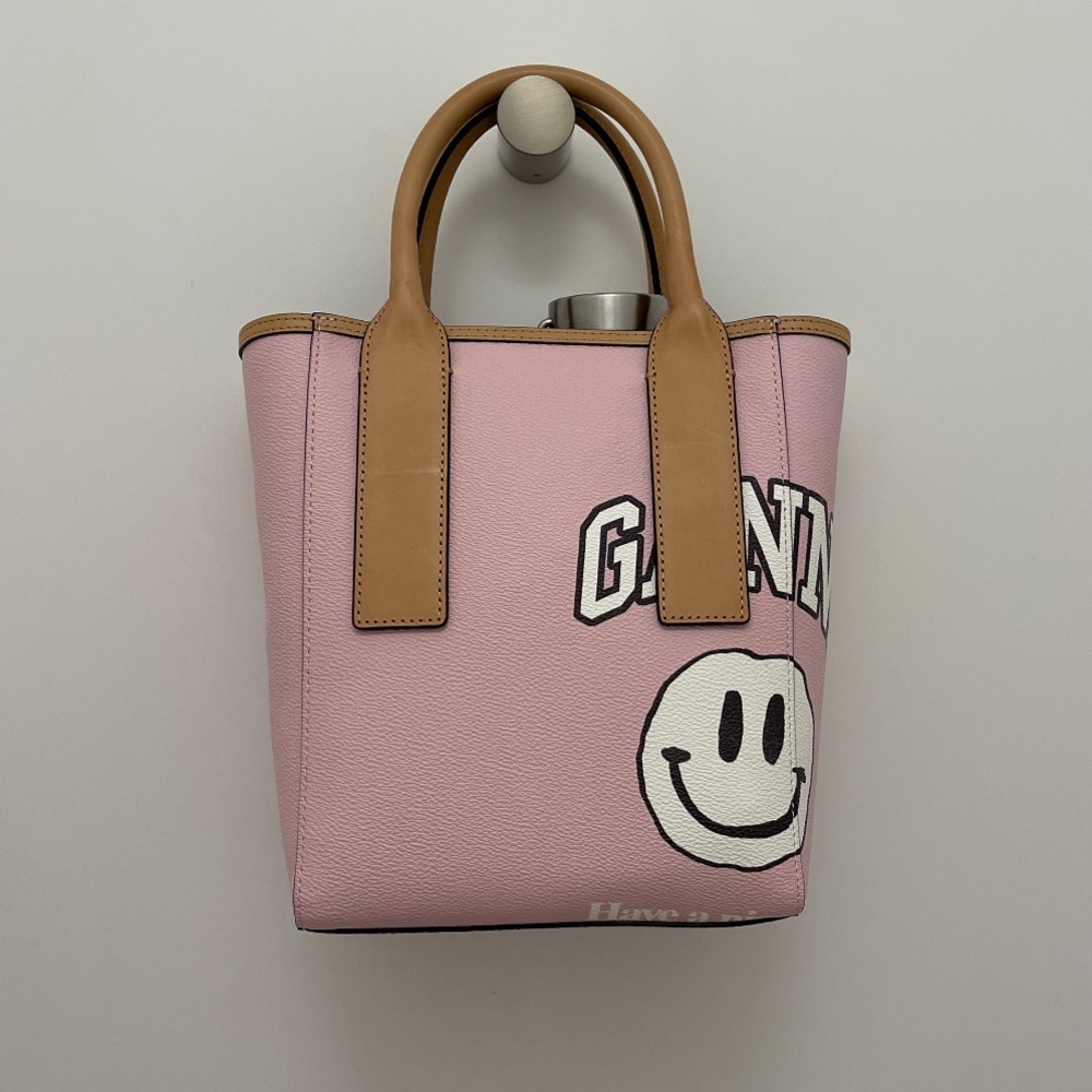 Beautiful pink Ganni smiley face bag.